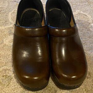 Dansko clogs. Very gently used. Great tread.